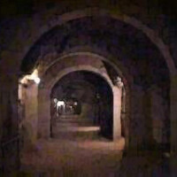 Un tetro corridoio della Fortezza di Enfer, Baronia di Chalard.